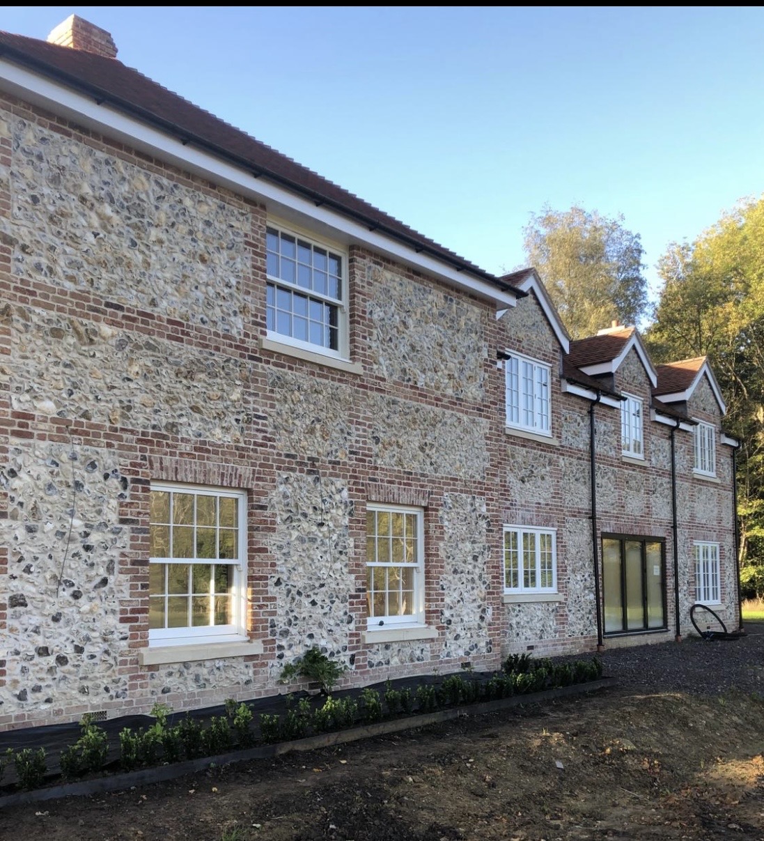 Flint and brick country house