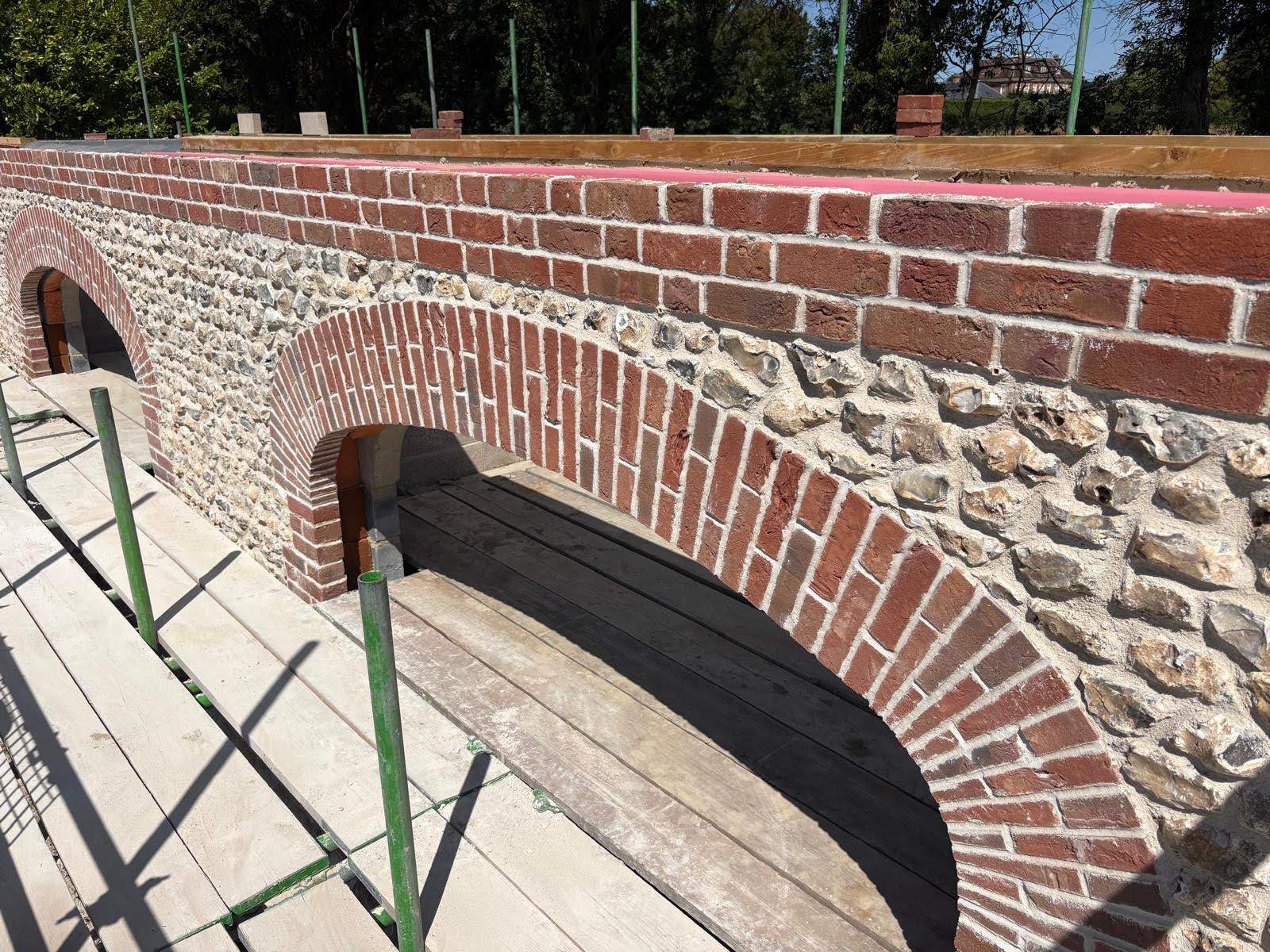 Brick and flint arched bridge detail